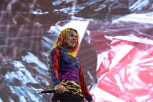 6ix9ine-Continues-His-Bug-Eating-Trend-By-Eating-A-Tarantula-In-Mexico.jpg
