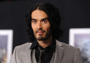 russell-brand-bragged-meghan-markle-kiss-1500x1048.jpg