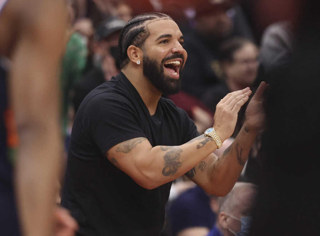 DrakeMiskeenFaceTattoo-1500x1110.jpg