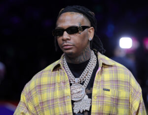 Moneybagg-Yo-Lawsuit-Paper-Bottle-Signing-Vegas-Hip-Hop-News-scaled.jpg