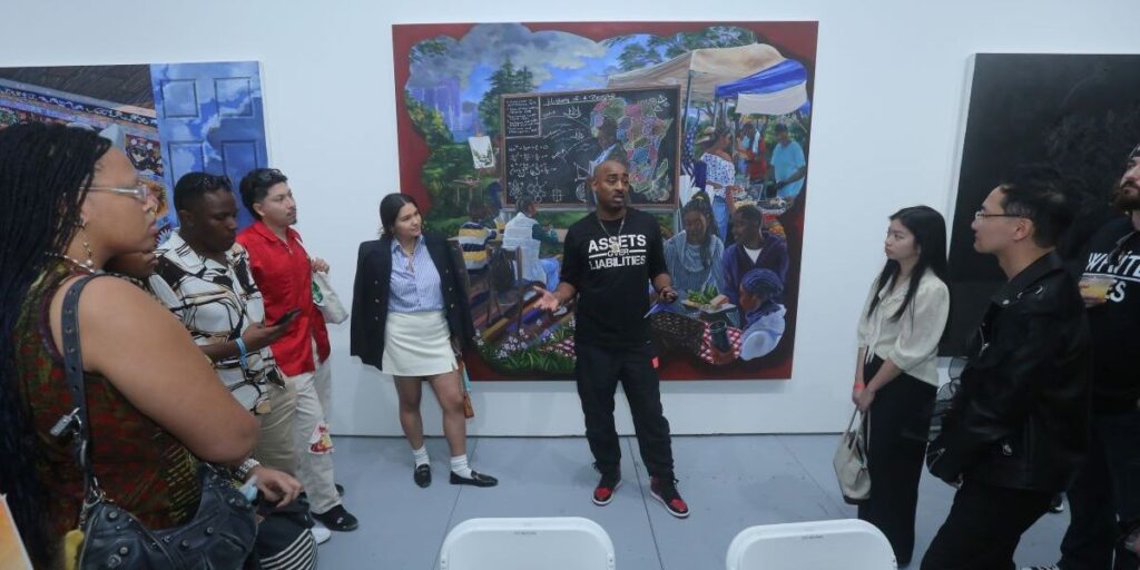gallerist-richard-beavers-speaks-to-students-with-the-fashion-for-all-foundation-at-the-richard-beavers-gallery-at-scope-art-fai.jpg
