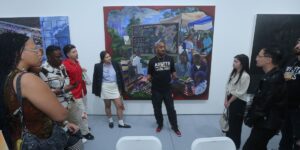 gallerist-richard-beavers-speaks-to-students-with-the-fashion-for-all-foundation-at-the-richard-beavers-gallery-at-scope-art-fai.jpg