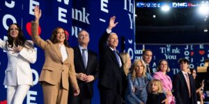 president-joe-biden-center-and-vice-president-kamala-harris-second-from-left-appear-with-their-families-after-biden-address.jpg