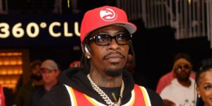 rapper-rich-homie-quan-performs-during-game-six-of-the-eastern-conference-first-round-playoffs-between-the-atlanta-hawks-and-the.jpg