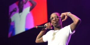 rich-homie-quan-performs-during-the-v-103-live-pop-up-concert-at-philips-arena-on-march-31-2018-in-atlanta-georgia.jpg