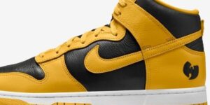 a-yellow-and-black-sneaker-with-a-wu-tang-logo.jpg