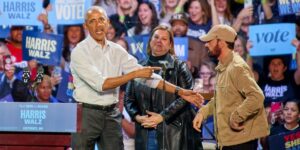 rapper-eminem-introduces-former-president-barack-obama-during-a-rally-to-supporters-of-vice-president-kamala-harris-2024-preside.jpg