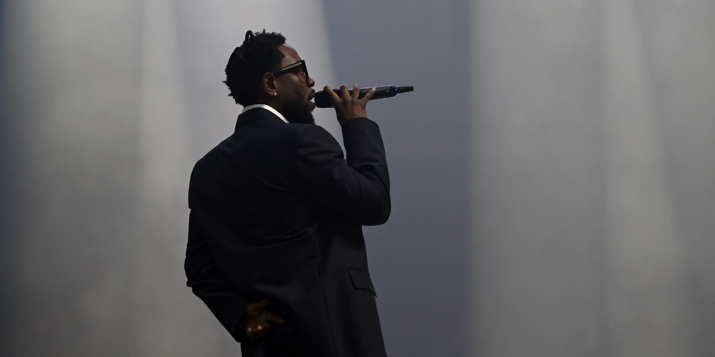 kendrick-lamar-performs-onstage-during-the-visa-cash-app-rb-formula-one-team-2024-livery-reveal-on-february-08-2024-in-las-vega.png