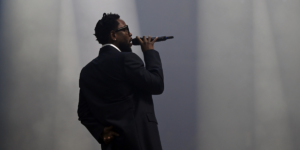 kendrick-lamar-performs-onstage-during-the-visa-cash-app-rb-formula-one-team-2024-livery-reveal-on-february-08-2024-in-las-vega.png