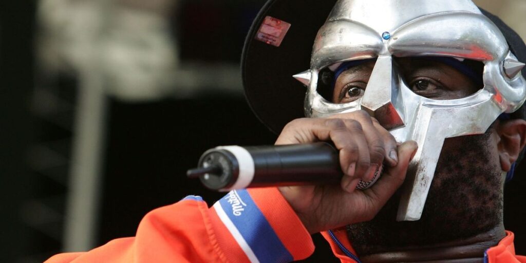 rapper-mf-doom-performs-at-a-benefit-concert-for-the-rhino-foundation-at-central-park-s-rumsey-playfield-on-june-28-2005-in-new.jpg