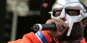 rapper-mf-doom-performs-at-a-benefit-concert-for-the-rhino-foundation-at-central-park-s-rumsey-playfield-on-june-28-2005-in-new.jpg