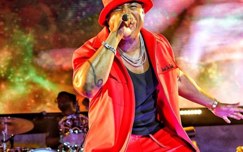 ll-cool-j-wearing-red-hat-and-suit.jpg