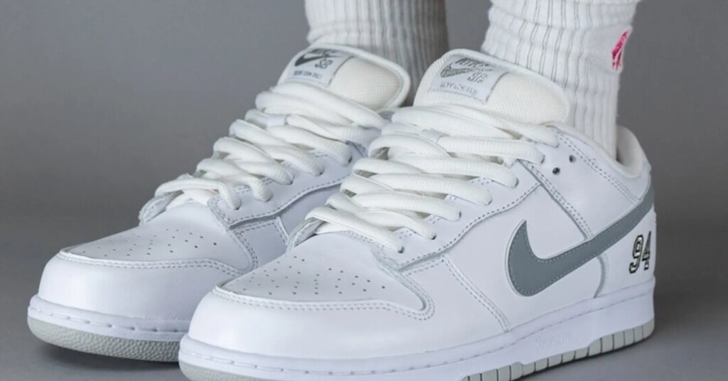 Supreme-Nike-SB-Dunk-Low-White-Metallic-Silver-HQ8487-100-1-e1736709985803.jpg