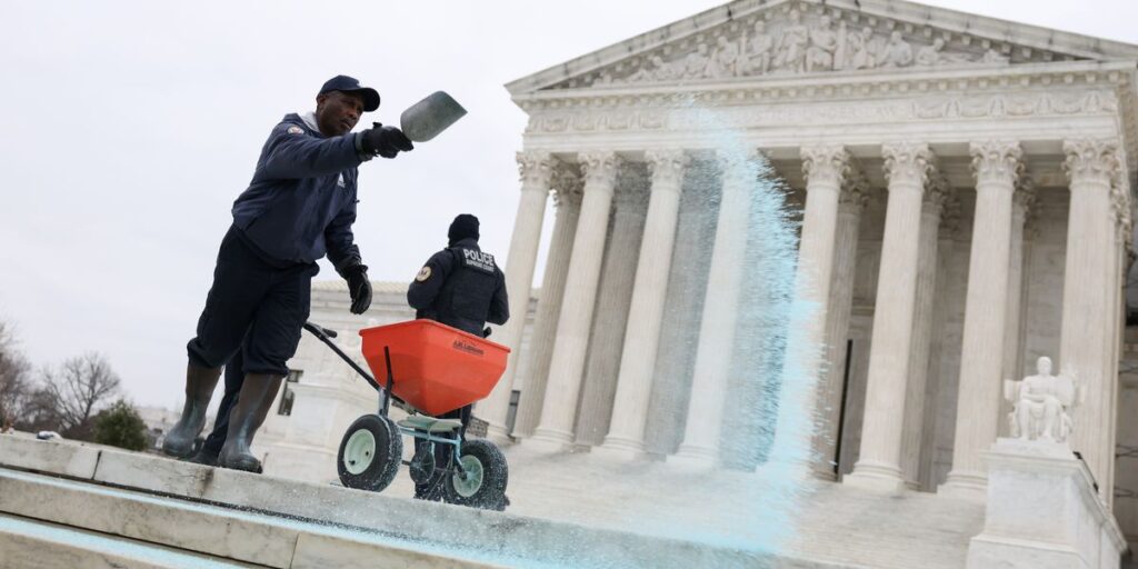 a-worker-throws-salt-on-the-steps-of-the-u-s-supreme-court-on-january-17-2025-the-supreme-court-ruled-that-the-social-media-p.jpg