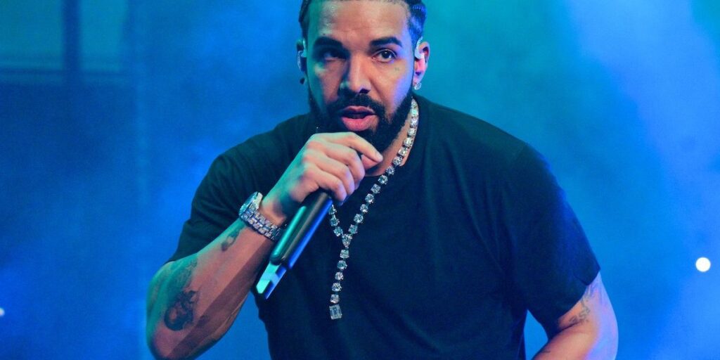 rapper-drake-performs-onstage-during-lil-baby-friends-birthday-celebration-concert-at-state-farm-arena-on-december-9-2022-i.jpg