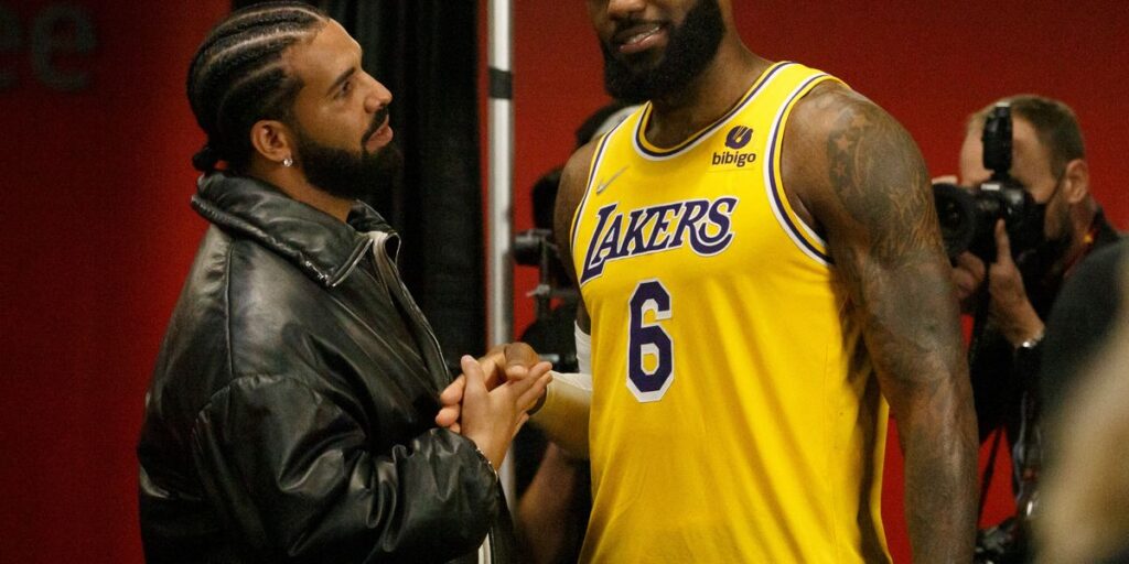 toronto-on-march-18-drake-and-lebron-james-6-of-the-los-angeles-lakers-talk-after-the-nba-game-between-the-toronto-raptors.jpg
