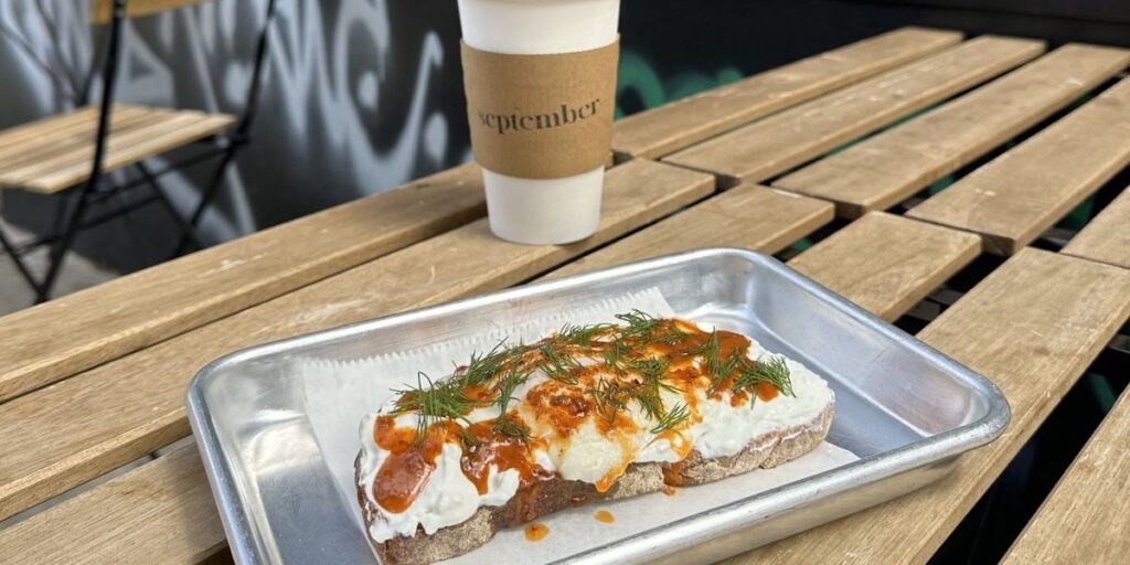 a-piece-of-toast-covered-in-delicious-looking-cheese-and-greens.jpg