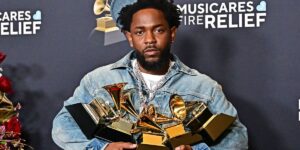 us-rapper-kendrick-lamar-poses-with-the-record-of-the-year-best-rap-performance-song-of-the-year-best-music-video-best-rap-s.jpg