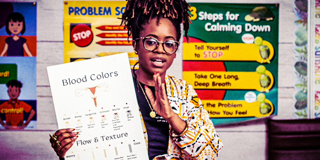 a-woman-holding-a-chart-that-contains-women-s-healthcare-and-hygiene-information.png