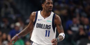 kyrie-irving-11-of-the-dallas-mavericks-looks-on-during-the-first-half-of-the-game-against-the-charlotte-hornets-at-american-ai.jpg