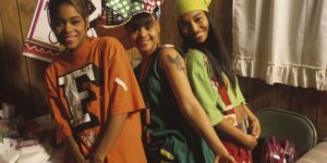 the-three-members-of-tlc-pose-for-an-old-photo-in-iconic-90s-style-oversized-outfits.jpg