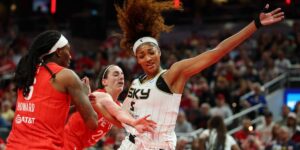 angel-reese-5-of-the-chicago-sky-takes-a-hard-foul-from-caitlin-clark-22-of-the-indiana-fever-in-the-second-half-during-the-fe.jpg