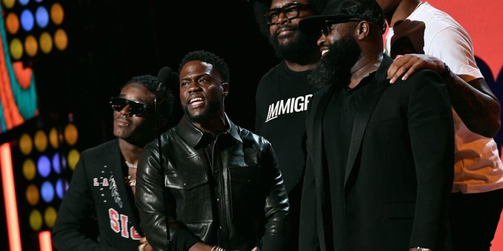 l-r-lil-uzi-vert-kevin-hart-questlove-and-black-thought-speak-onstage-at-the-2018-bet-awards-at-microsoft-theater-on-june.jpg