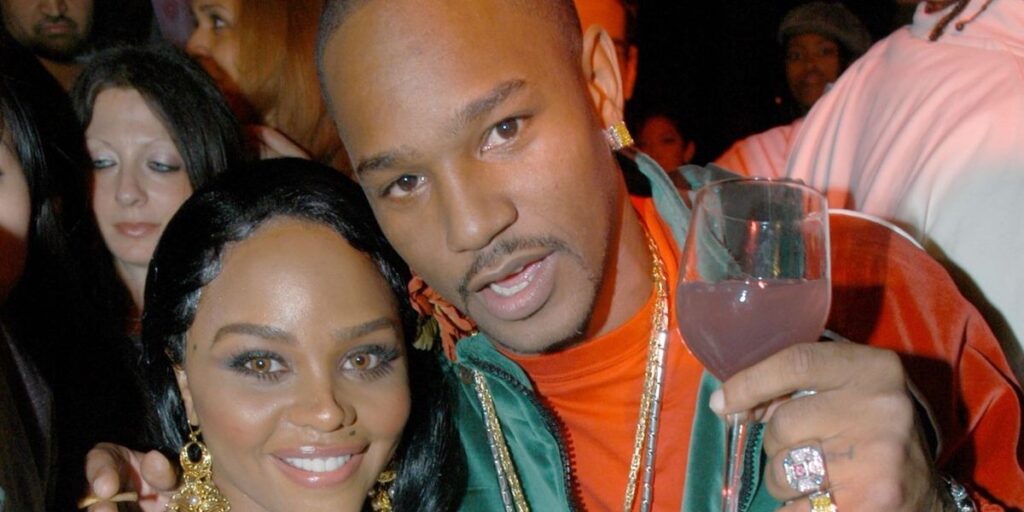 lil-kim-and-cam-ron-during-patricia-field-for-the-house-of-rocawear-lounge-at-ono-at-the-hotel-gansevort-in-new-york-city-new.jpg
