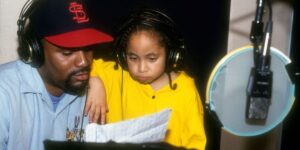 seven-year-old-raven-symone-works-with-producer-hitman-howie-tee-aka-howard-thompson-when-she-records-her-here-s-to-new-dream.jpg